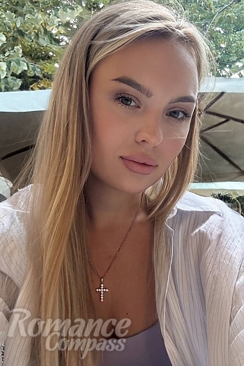 Ukrainian mail order bride Olena from Odesa with light brown hair and green eye color - image 1