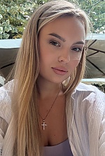 Ukrainian mail order bride Olena from Odesa with light brown hair and green eye color - image 9