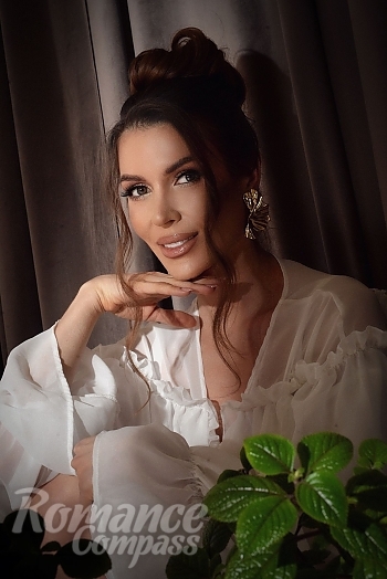 Ukrainian mail order bride Marina from Lviv with light brown hair and hazel eye color - image 1