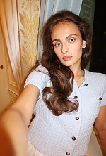 Ukrainian mail order bride Yevhenia from Nuremberg with brunette hair and green eye color - image 11