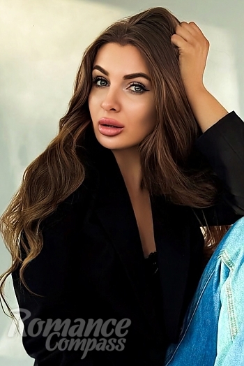 Ukrainian mail order bride Lizaveta from Kyiv with light brown hair and blue eye color - image 1