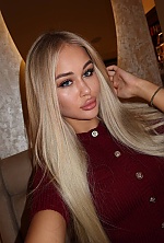 Ukrainian mail order bride Daria from Kyiv with blonde hair and blue eye color - image 12