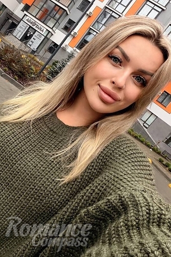 Ukrainian mail order bride Victoria from Rivne with blonde hair and blue eye color - image 1