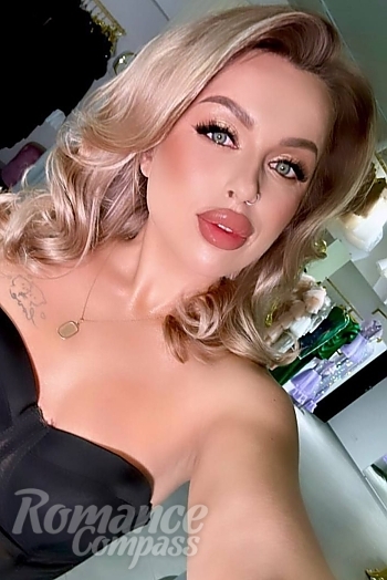 Ukrainian mail order bride Victoria from Rivne with blonde hair and blue eye color - image 1