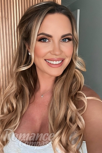 Ukrainian mail order bride Olha from Cagnes-sur-Mer with blonde hair and blue eye color - image 1