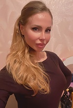 Ukrainian mail order bride Lyudmila from Zviahel with blonde hair and blue eye color - image 14