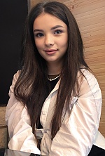 Ukrainian mail order bride Anna from Kyiv with black hair and blue eye color - image 5