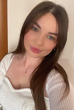 Ukrainian mail order bride Anna from Kyiv with black hair and blue eye color - image 11