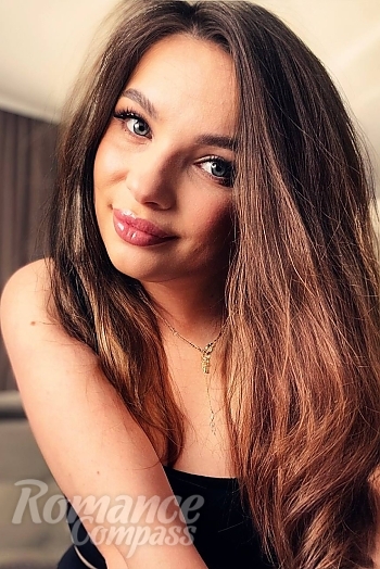 Ukrainian mail order bride Anna from Kyiv with black hair and blue eye color - image 1