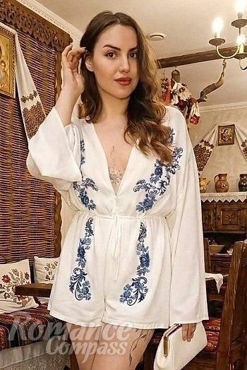 Ukrainian mail order bride Irina from Amsterdam with black hair and brown eye color - image 1