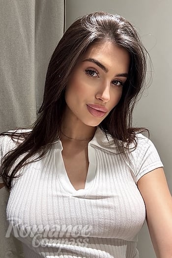 Ukrainian mail order bride Anastasia from Kyiv with light brown hair and green eye color - image 1