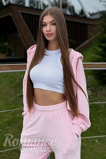 Ukrainian mail order bride Angela from Kyiv with light brown hair and green eye color - image 1