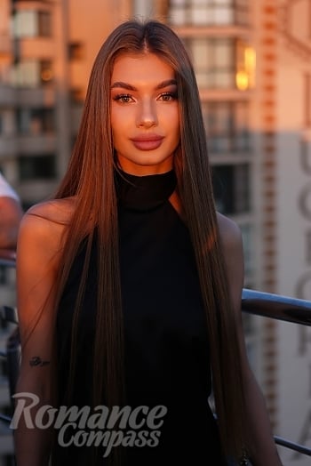 Ukrainian mail order bride Angela from Kyiv with light brown hair and green eye color - image 1