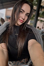 Ukrainian mail order bride Diana from Kyiv with black hair and brown eye color - image 6