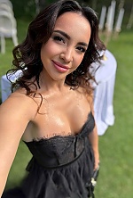 Ukrainian mail order bride Diana from Kyiv with black hair and brown eye color - image 8