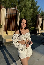 Ukrainian mail order bride Diana from Kyiv with black hair and brown eye color - image 5