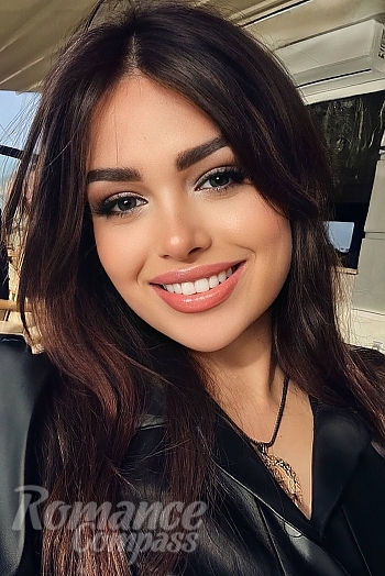 Ukrainian mail order bride Amina from Lviv with blonde hair and green eye color - image 1