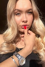 Ukrainian mail order bride Oleksandra from Kyiv with blonde hair and blue eye color - image 7