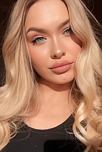 Ukrainian mail order bride Oleksandra from Kyiv with blonde hair and blue eye color - image 4