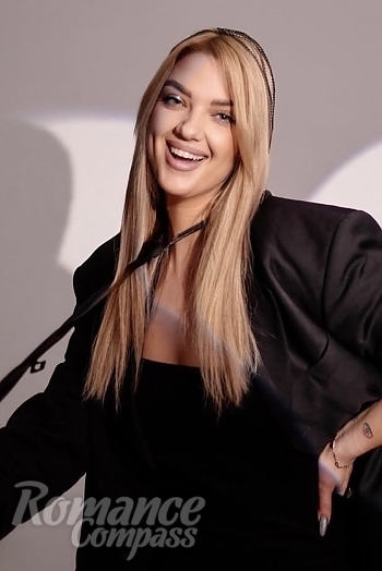 Ukrainian mail order bride Nataliia from Odesa with blonde hair and blue eye color - image 1