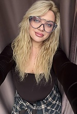 Ukrainian mail order bride Nataliia from Odesa with blonde hair and blue eye color - image 8