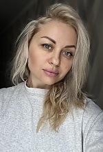 Ukrainian mail order bride Liudmila from Chisinau with blonde hair and blue eye color - image 9