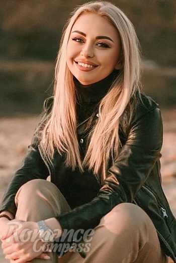 Ukrainian mail order bride Liudmila from Chisinau with blonde hair and blue eye color - image 1