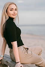 Ukrainian mail order bride Liudmila from Chisinau with blonde hair and blue eye color - image 4