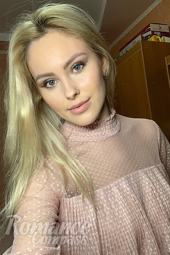Ukrainian mail order bride Victoria from Kyiv with blonde hair and blue eye color - image 1