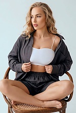 Ukrainian mail order bride Nina from Chisinau with light brown hair and blue eye color - image 4