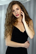 Ukrainian mail order bride Ivanna from Kyiv with light brown hair and green eye color - image 8
