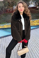 Ukrainian mail order bride Ivanna from Kyiv with light brown hair and green eye color - image 5