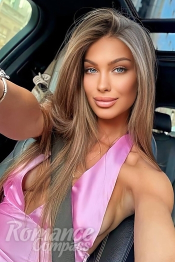 Ukrainian mail order bride Malica from Belgrade with light brown hair and blue eye color - image 1