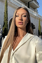 Ukrainian mail order bride Malica from Belgrade with light brown hair and blue eye color - image 7