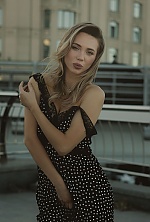 Ukrainian mail order bride Anastasia from Kyiv with blonde hair and blue eye color - image 12