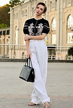 Ukrainian mail order bride Anastasia from Kyiv with blonde hair and blue eye color - image 8