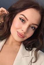 Ukrainian mail order bride Anna from Lviv with light brown hair and brown eye color - image 24