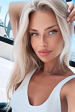 Ukrainian mail order bride Olena from Madrid with blonde hair and green eye color - image 2