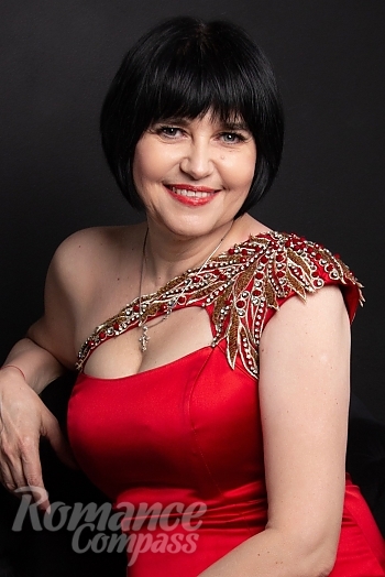 Ukrainian mail order bride Elena from Odesa with black hair and blue eye color - image 1