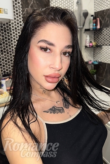 Ukrainian mail order bride Anhelina from Brovary with black hair and brown eye color - image 1