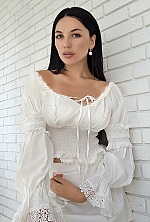 Ukrainian mail order bride Galina from Kyiv with black hair and green eye color - image 2