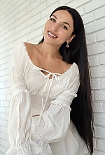 Ukrainian mail order bride Galina from Kyiv with black hair and green eye color - image 2