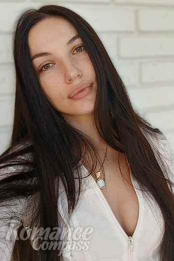 Ukrainian mail order bride Galina from Kyiv with black hair and green eye color - image 1