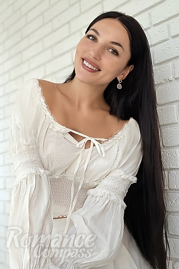 Ukrainian mail order bride Galina from Kyiv with black hair and green eye color - image 1