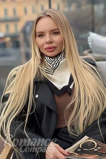 Ukrainian mail order bride Yevheniia from Tbilisi with blonde hair and blue eye color - image 1