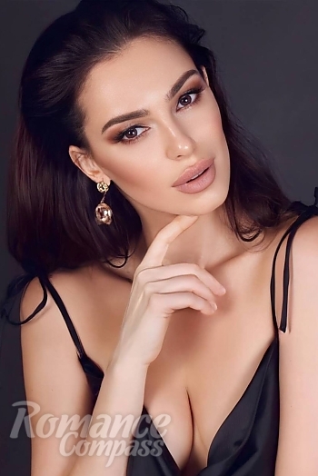 Ukrainian mail order bride Marina from Tbilisi with brunette hair and black eye color - image 1