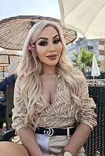 Ukrainian mail order bride Karlygash from Almaty with blonde hair and brown eye color - image 9