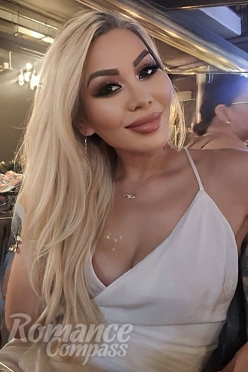 Ukrainian mail order bride Karlygash from Almaty with blonde hair and brown eye color - image 1