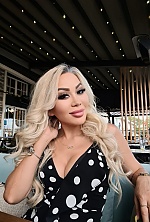 Ukrainian mail order bride Karlygash from Almaty with blonde hair and brown eye color - image 3