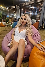 Ukrainian mail order bride Karlygash from Almaty with blonde hair and brown eye color - image 4